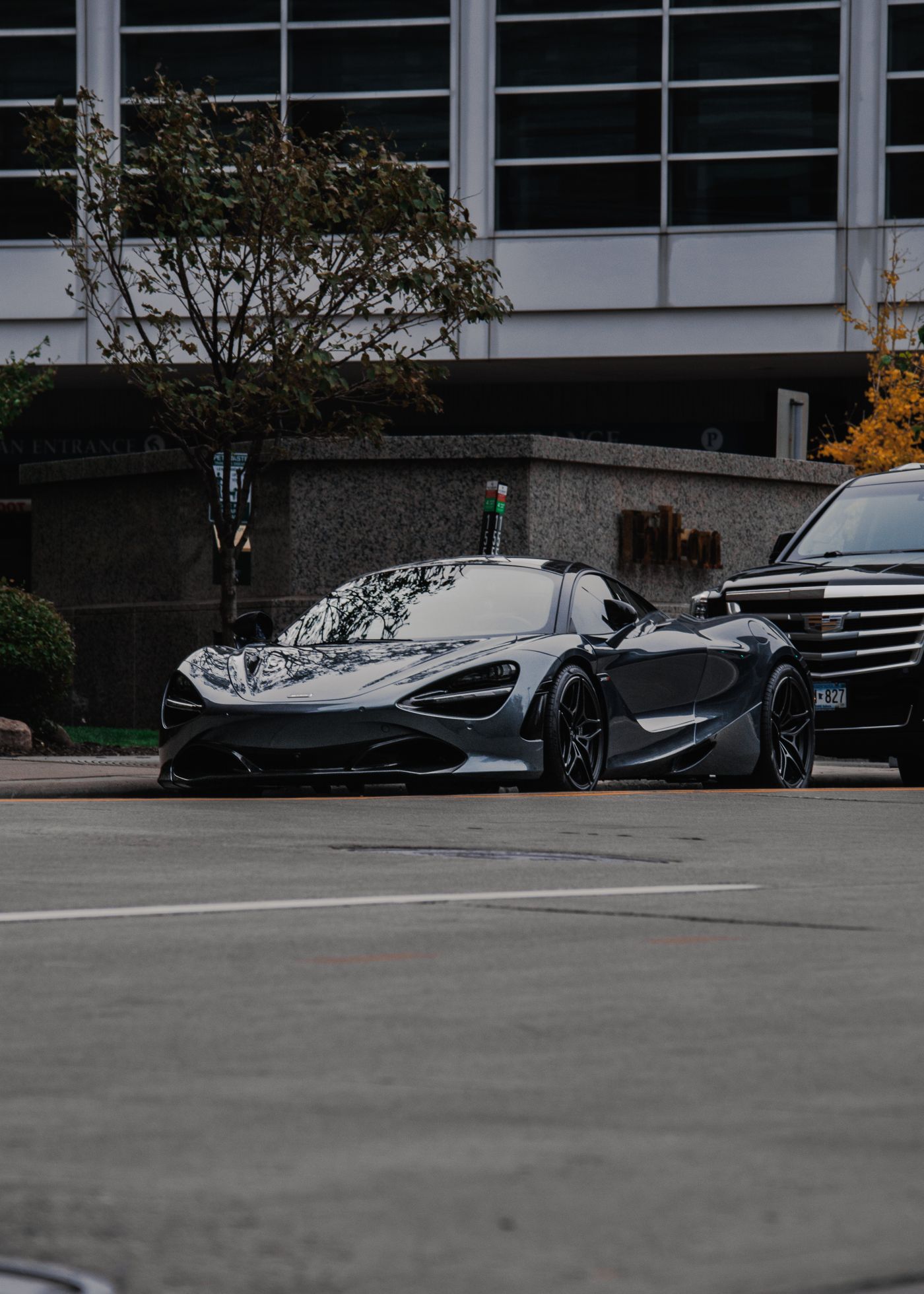Grey supercar with a mirror-gloss finish after detailing